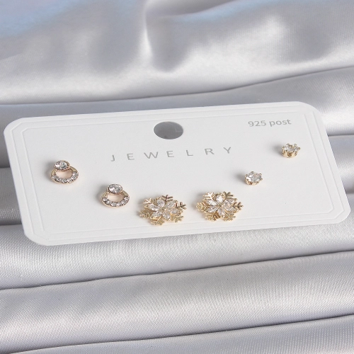 Pirinç Gold Renk Zirkon Taşlı Kar Tanesi Model 925 Ayar Gümüş Çivi Kadın Küpe Seti